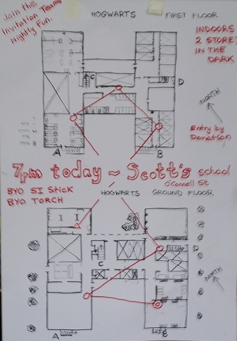 Hand-drawn school map showing building layout with rooms labeled A–D, and red route lines connecting key rooms and handwritten notes.
